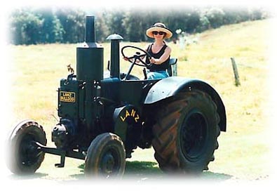 Deb rides a tractor