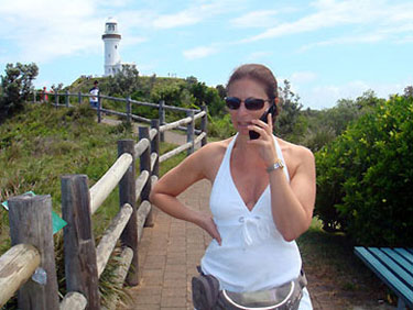 Debbie does phone at lighthouse